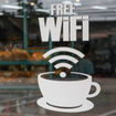 White decal &quot;Free Wi-Fi&quot; sign in coffee shop window