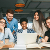 Five diverse teens centered around a school-issued laptop
