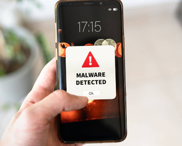 A pop-up malware alert on iPhone locked screen